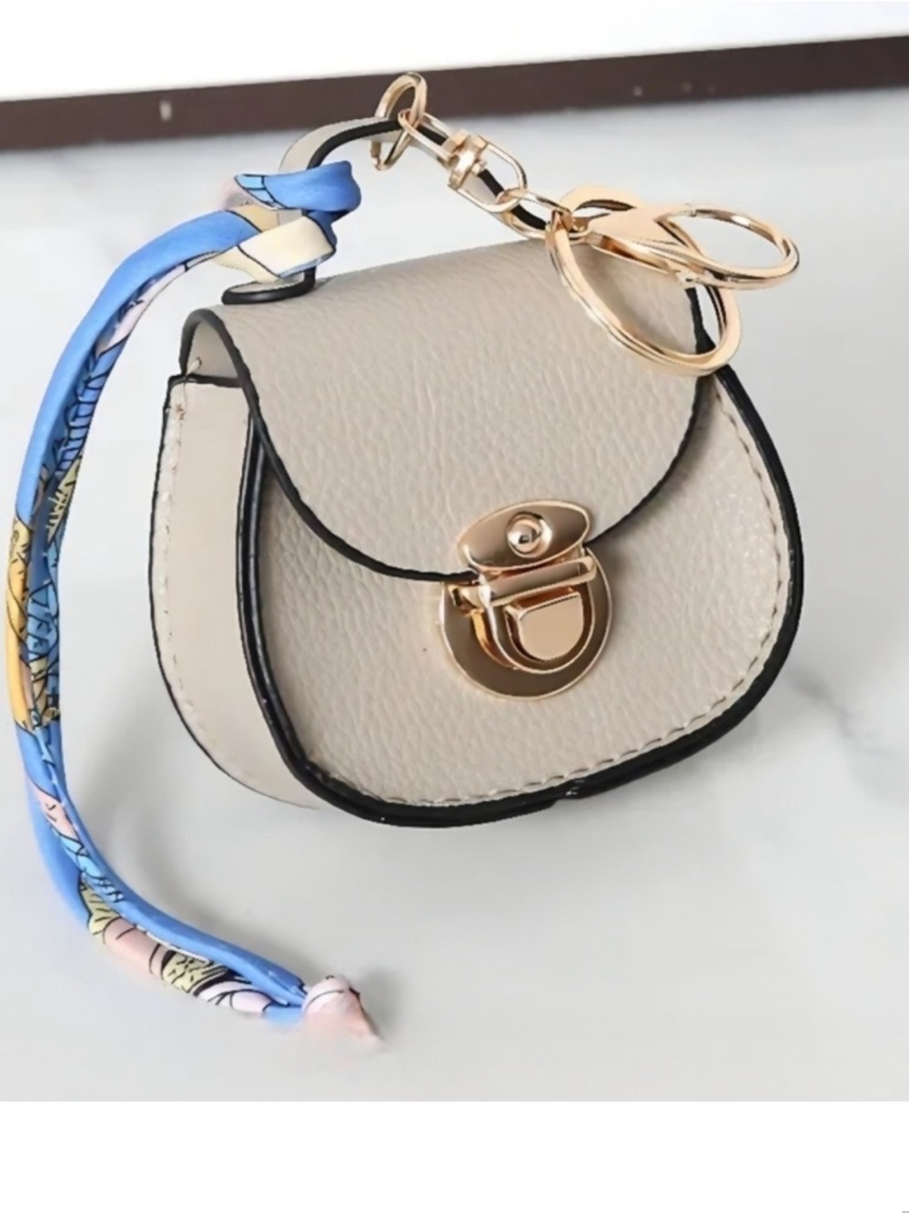 Bag Charm/Ear Bud Holder Mini Saddle with gold tone accents for attachment! New